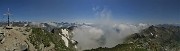 56 In vetta al Crono Stella (2620 m), nuvoloso verso la Val Brembana